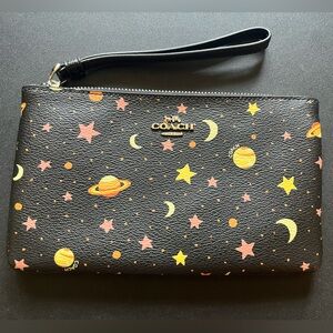 Coach Wristlet In Black With Space pattern